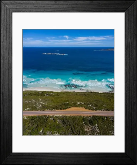Framed Print : Aerial view of the empty road beside the ocean at Ten Mile Lagoon in Esperance, Western Australia Framed Print : Aerial view of the empty road beside the ocean at Ten Mile Lagoon in Esperance, Western Australia