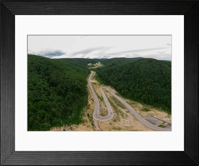Framed Print : Aerial top vew of winding road in the mountains Framed Print : Aerial top vew of winding road in the mountains