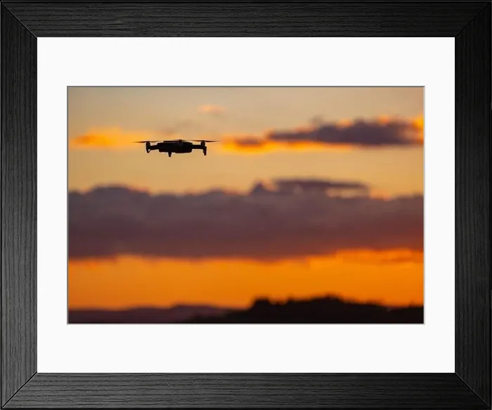 Framed Print : Drone against the background of the setting sun Framed Print : Drone against the background of the setting sun
