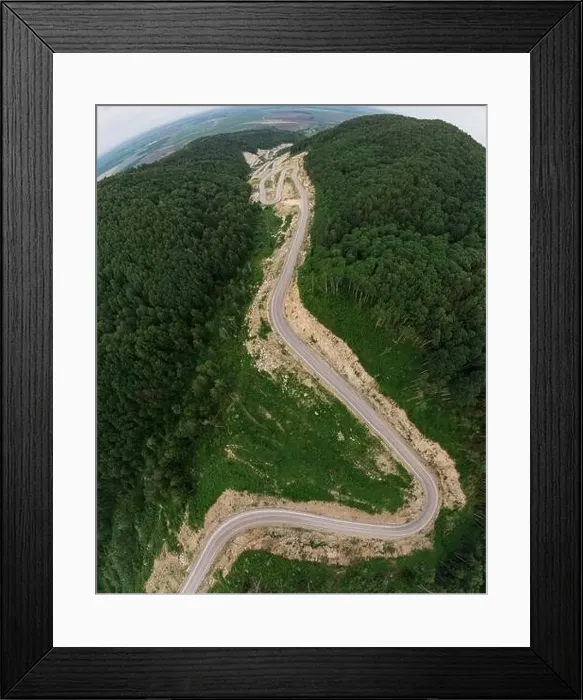 Framed Print : Aerial top vew of winding road in the mountains Framed Print : Aerial top vew of winding road in the mountains