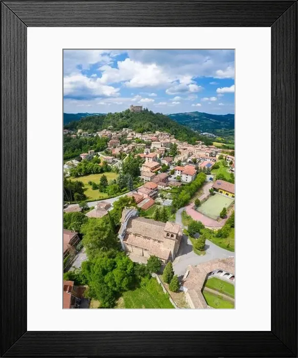 Framed Print : Aerial view of the church, octagonal cemetery and castle of Zavattarello Framed Print : Aerial view of the church, octagonal cemetery and castle of Zavattarello