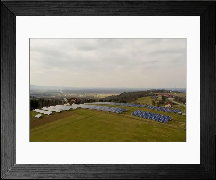 Framed Print : Aerial view of large field of solar photo voltaic panels system producing renewable clean energy on green grass Framed Print : Aerial view of large field of solar photo voltaic panels system producing renewable clean energy on green grass
