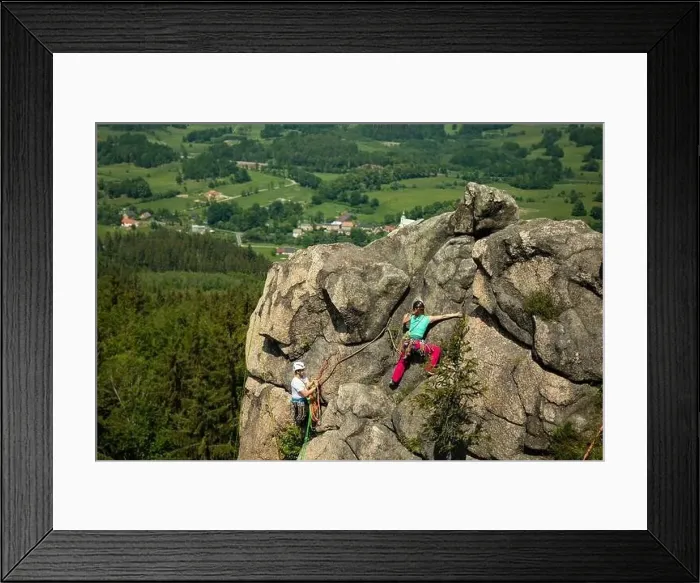 Framed Print : Woman climbing near the top with amazing areal view on the surroundings Framed Print : Woman climbing near the top with amazing areal view on the surroundings
