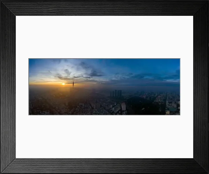Framed Print : Ho Chi Minh City early morning aerial panorama with fog over Binh Thanh and District one featuring sunrise Framed Print : Ho Chi Minh City early morning aerial panorama with fog over Binh Thanh and District one featuring sunrise