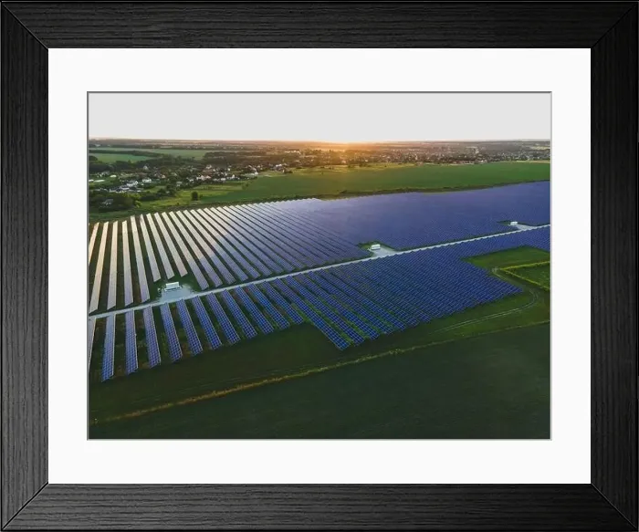 Framed Print : Aerial drone view of large solar panels at a solar farm at bright summer sunset. Solar cell power plants, colorful photo Framed Print : Aerial drone view of large solar panels at a solar farm at bright summer sunset. Solar cell power plants, colorful photo