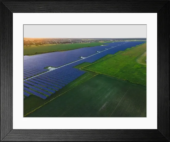 Framed Print : Aerial drone view of large solar panels at a solar farm at bright summer sunset. Solar cell power plants, colorful photo Framed Print : Aerial drone view of large solar panels at a solar farm at bright summer sunset. Solar cell power plants, colorful photo