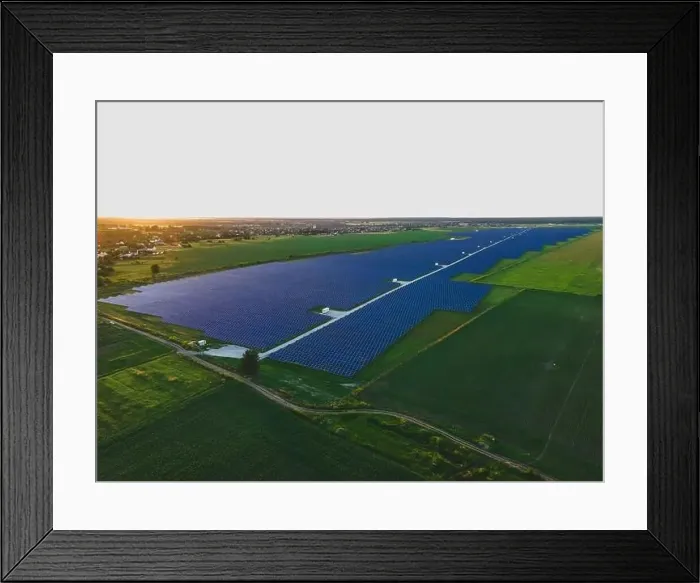 Framed Print : Aerial drone view of large solar panels at a solar farm at bright summer sunset. Solar cell power plants, colorful photo Framed Print : Aerial drone view of large solar panels at a solar farm at bright summer sunset. Solar cell power plants, colorful photo