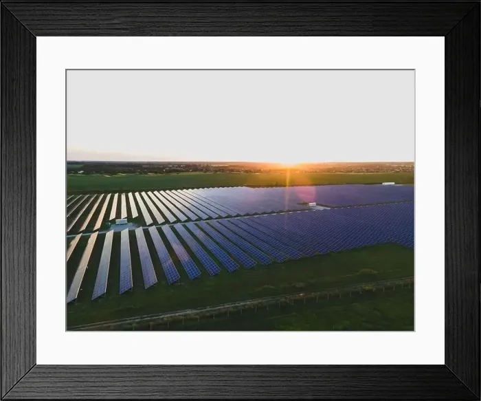 Framed Print : Aerial drone view of large solar panels at a solar farm at bright summer sunset. Solar cell power plants, colorful photo Framed Print : Aerial drone view of large solar panels at a solar farm at bright summer sunset. Solar cell power plants, colorful photo