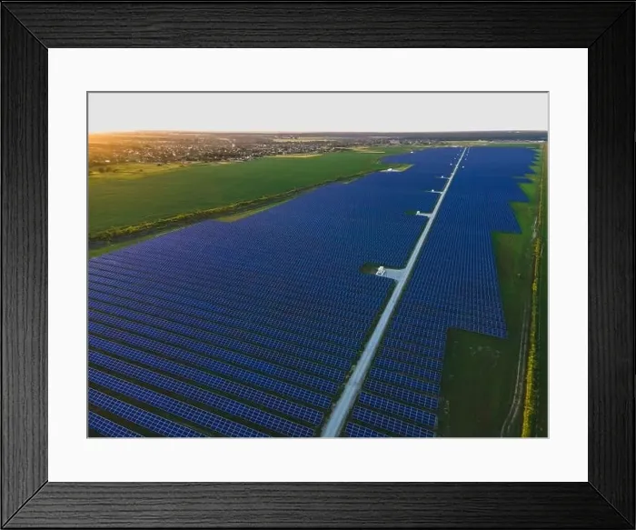 Framed Print : Aerial drone view of large solar panels at a solar farm at bright summer sunset. Solar cell power plants, colorful photo Framed Print : Aerial drone view of large solar panels at a solar farm at bright summer sunset. Solar cell power plants, colorful photo