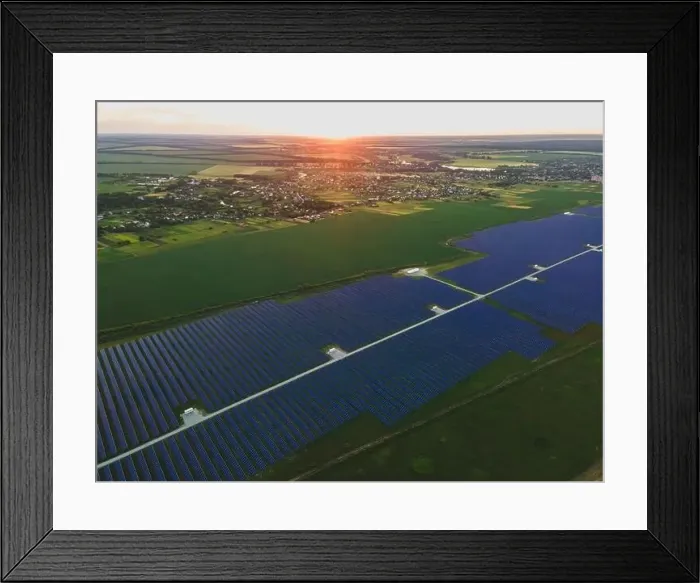 Framed Print : Aerial drone view of large solar panels at a solar farm at bright summer sunset. Solar cell power plants, colorful photo Framed Print : Aerial drone view of large solar panels at a solar farm at bright summer sunset. Solar cell power plants, colorful photo
