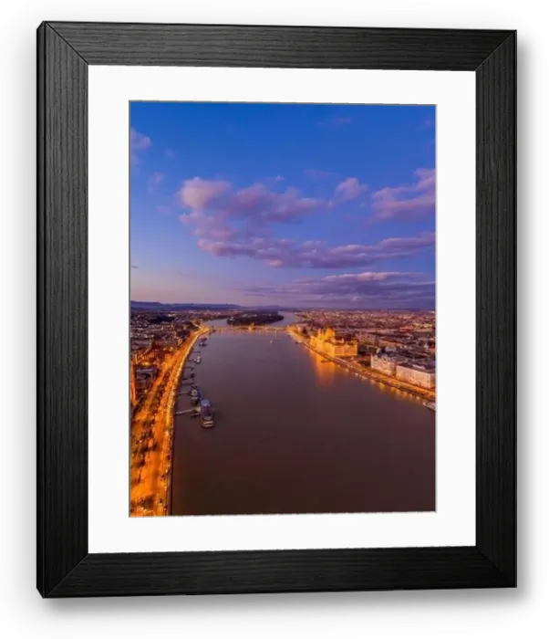 Framed Print : Aerial drone shot of lighted Hungarian Parliament by Danube river in purple Budapest sunset hour Framed Print : Aerial drone shot of lighted Hungarian Parliament by Danube river in purple Budapest sunset hour