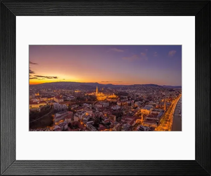 Framed Print : Aerial drone shot of lighted Matthias Churh Fisherman's Bastion on Buda Hill in Budapest sunset time Framed Print : Aerial drone shot of lighted Matthias Churh Fisherman's Bastion on Buda Hill in Budapest sunset time