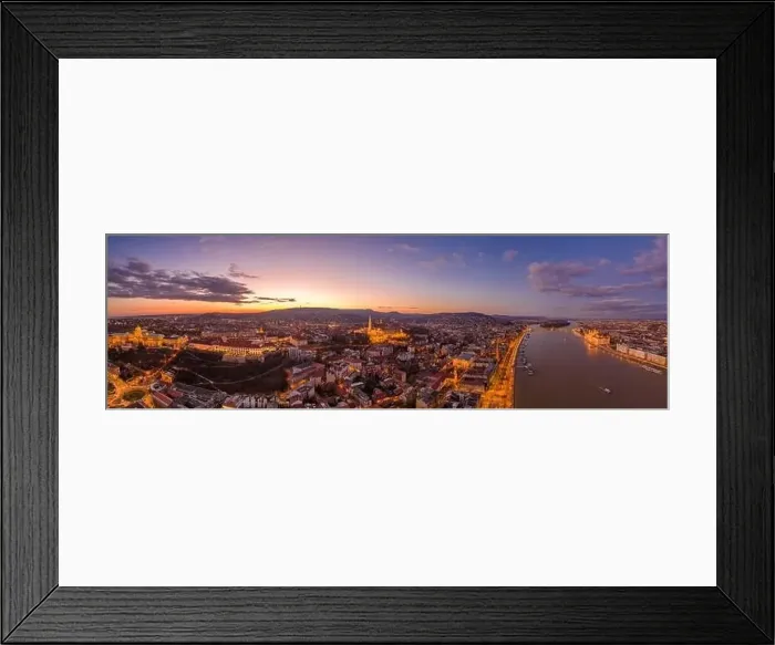 Framed Print : Panoramic aerial drone shot of lighted Matthias Churh Buda castle Fisherman Bastion on hill by Danube in Budapest sunset Framed Print : Panoramic aerial drone shot of lighted Matthias Churh Buda castle Fisherman Bastion on hill by Danube in Budapest sunset