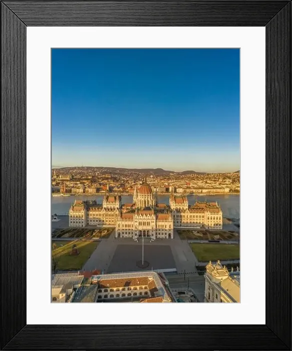 Framed Print : Aerial drone shot of east side facade of Hungarian Parliament Kossuth Square during Budapest sunrise Framed Print : Aerial drone shot of east side facade of Hungarian Parliament Kossuth Square during Budapest sunrise