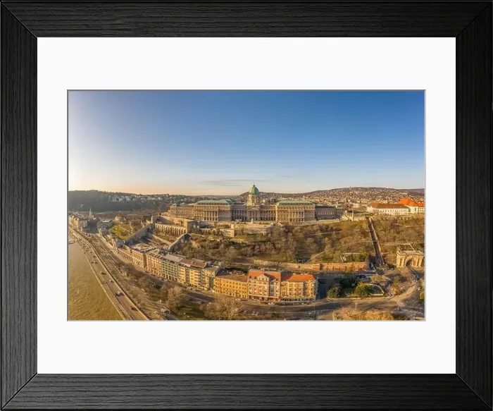 Framed Print : Aerial drone shot of Buda Castle palace facade on hill in Budapest sunrise glow Framed Print : Aerial drone shot of Buda Castle palace facade on hill in Budapest sunrise glow