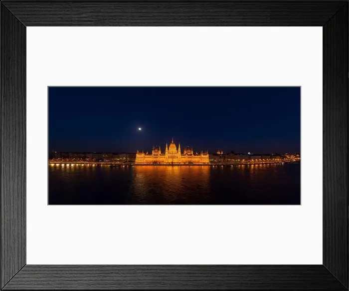 Framed Print : Panoramic aerial drone shot of front facade of Hungarian Parliament with lights on in Budapest night Framed Print : Panoramic aerial drone shot of front facade of Hungarian Parliament with lights on in Budapest night