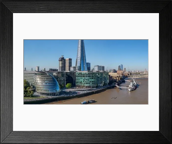 Framed Print : Aerial cityscape of the Thames river on a sunny day with the City Hall, skyscraper and London skyline Framed Print : Aerial cityscape of the Thames river on a sunny day with the City Hall, skyscraper and London skyline