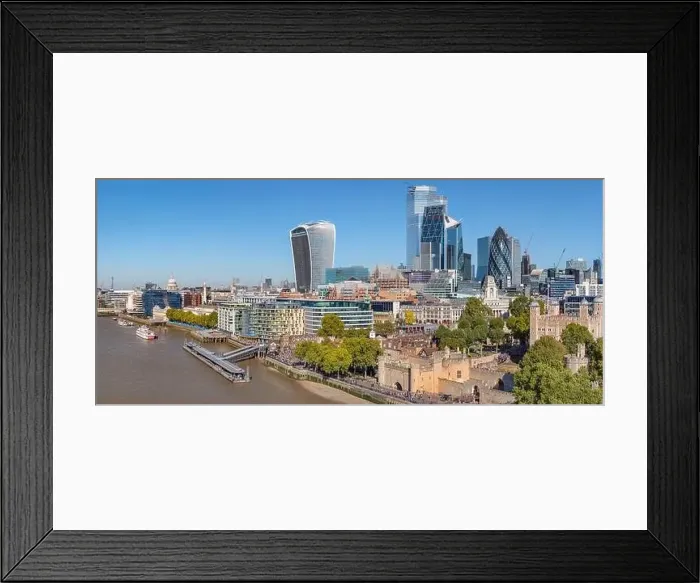 Framed Print : Aerial cityscape of the Thames river on a sunny day with the City Financial district skyscrapers and Tower of London Framed Print : Aerial cityscape of the Thames river on a sunny day with the City Financial district skyscrapers and Tower of London