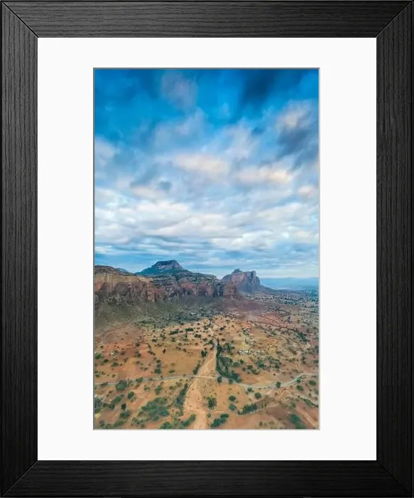 Framed Print : Aerial panoramic by drone of clouds at sunset over Gheralta Mountains, Hawzen, Tigray Region, Ethiopia, Africa Framed Print : Aerial panoramic by drone of clouds at sunset over Gheralta Mountains, Hawzen, Tigray Region, Ethiopia, Africa