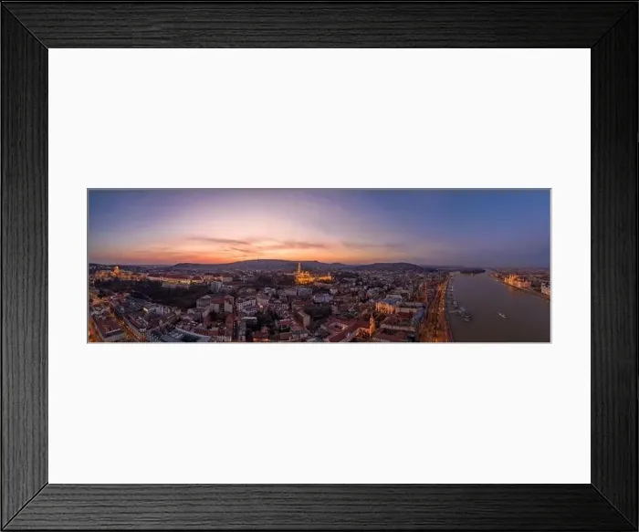 Framed Print : Panoramic aerial drone shot of lighted Matthias Church Buda castle on Buda Hill by Danube in Budapest sunset Framed Print : Panoramic aerial drone shot of lighted Matthias Church Buda castle on Buda Hill by Danube in Budapest sunset