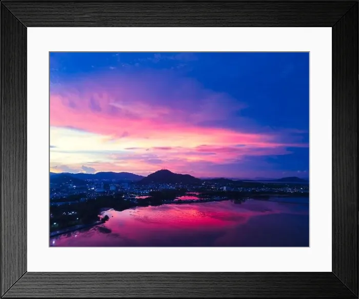 Framed Print : Aerial drone view beautiful twilignt sky after sunset over bay and town Framed Print : Aerial drone view beautiful twilignt sky after sunset over bay and town