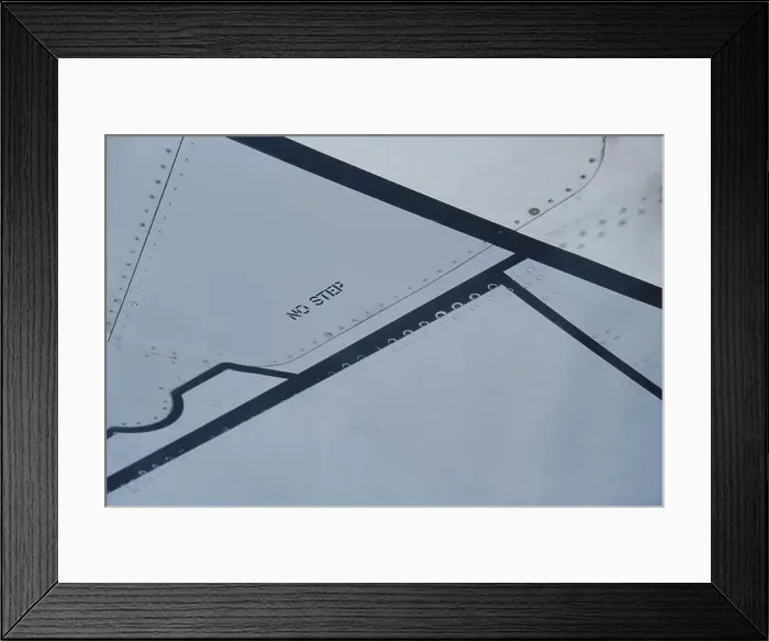 Framed Print : No step sign on the commercial airplane wing Framed Print : No step sign on the commercial airplane wing