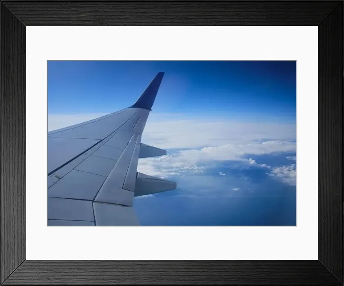 Framed Print : Airplane window view. Sky view from commercial airplane porthole Framed Print : Airplane window view. Sky view from commercial airplane porthole