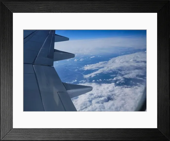Framed Print : Aerial view of the Earth landscape. Map view with clouds and river from airplane porthole Framed Print : Aerial view of the Earth landscape. Map view with clouds and river from airplane porthole
