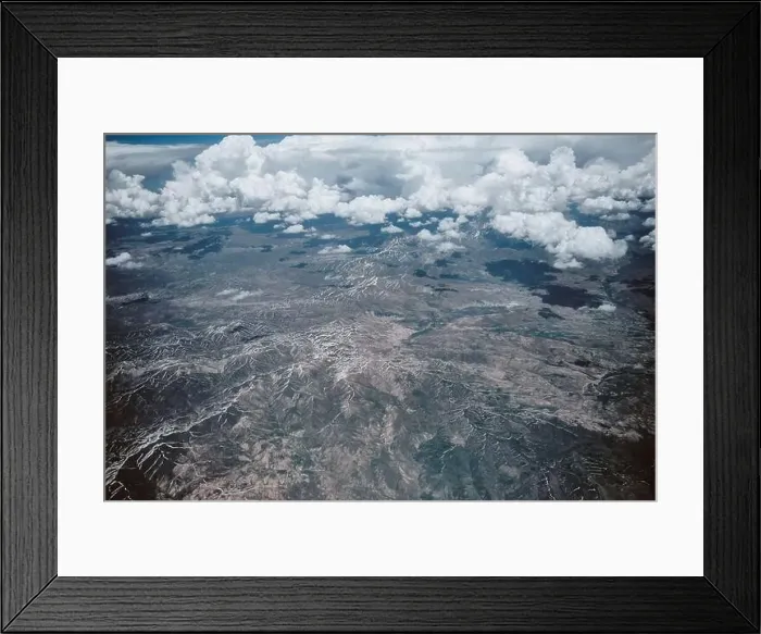 Framed Print : Aerial mountains under clouds map view. Airplane view middle east landscape Framed Print : Aerial mountains under clouds map view. Airplane view middle east landscape