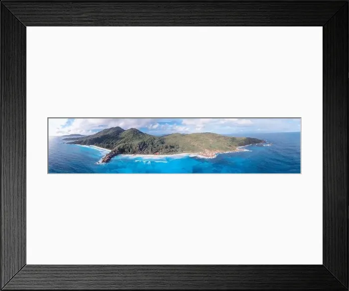 Framed Print : Aerial view of tropical island with sea, vegetation and shoreline Framed Print : Aerial view of tropical island with sea, vegetation and shoreline