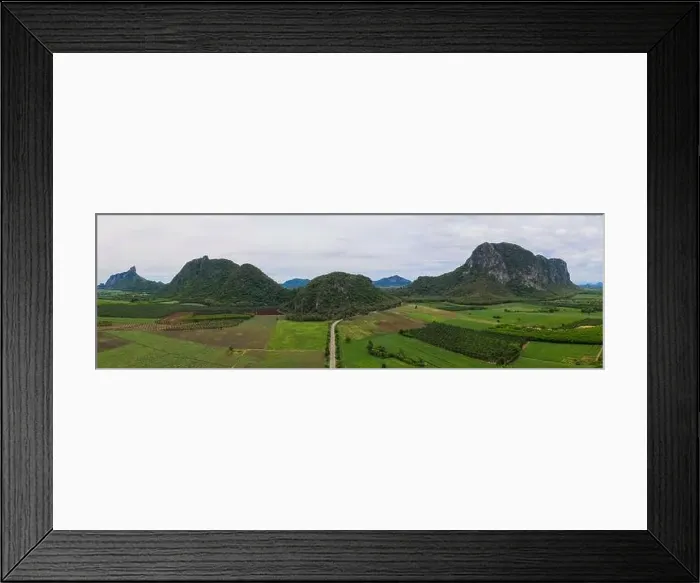 Framed Print : Aerial view Drone Panorama. Mountain and corn field in Rainy season. Agriculture and beautiful nature Framed Print : Aerial view Drone Panorama. Mountain and corn field in Rainy season. Agriculture and beautiful nature