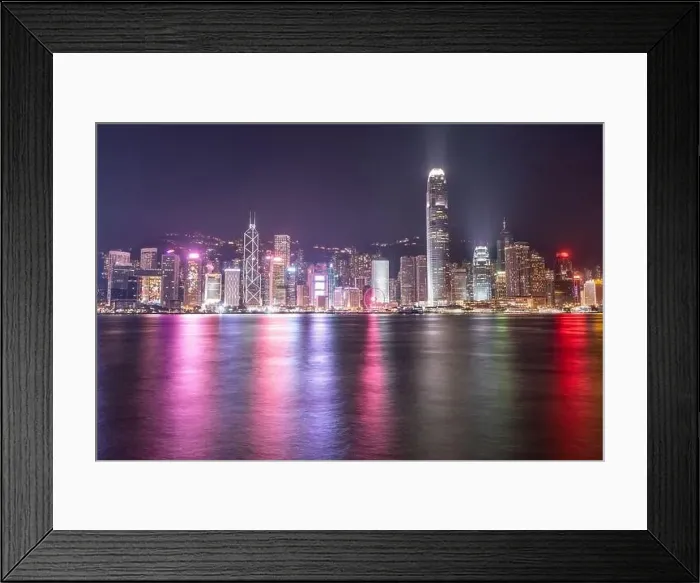 Framed Print : The incredible night cityscape view of lights on the water on Victoria Harbour in Hong Kong Framed Print : The incredible night cityscape view of lights on the water on Victoria Harbour in Hong Kong
