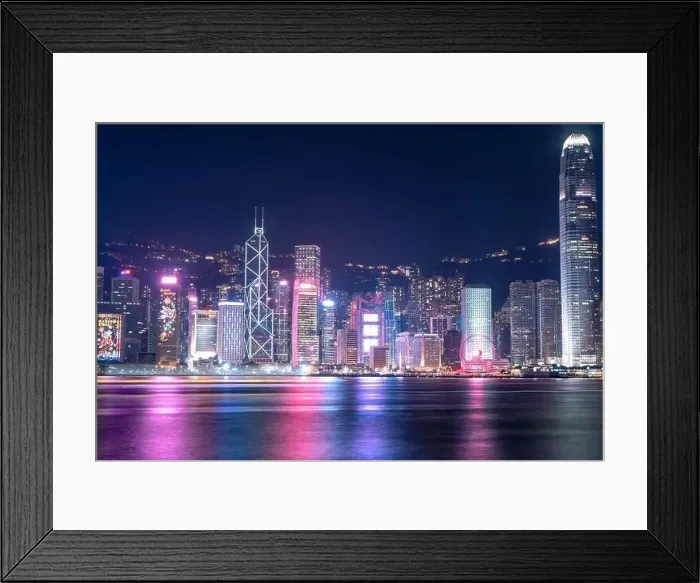 Framed Print : The incredible night cityscape view of lights on the water on Victoria Harbour in Hong Kong Framed Print : The incredible night cityscape view of lights on the water on Victoria Harbour in Hong Kong