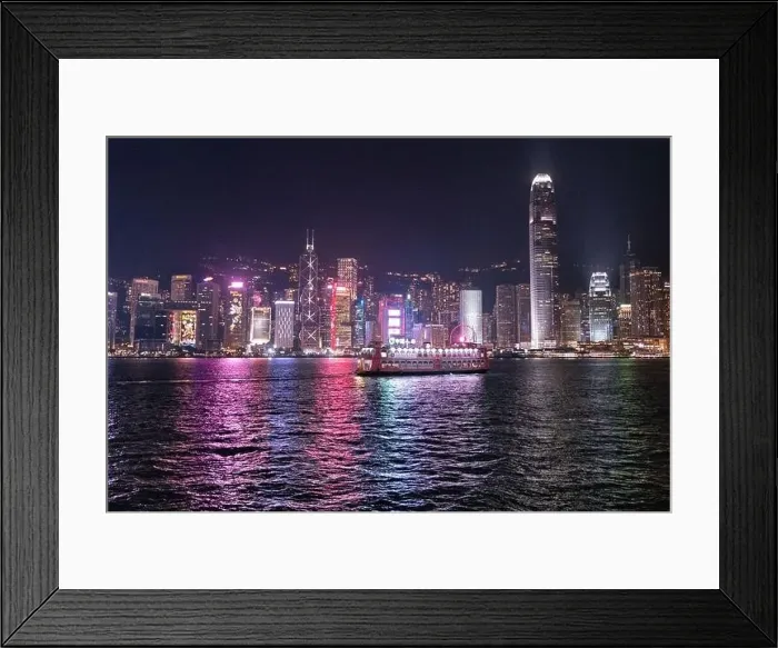Framed Print : The incredible night cityscape view of lights on the water on Victoria Harbour in Hong Kong Framed Print : The incredible night cityscape view of lights on the water on Victoria Harbour in Hong Kong