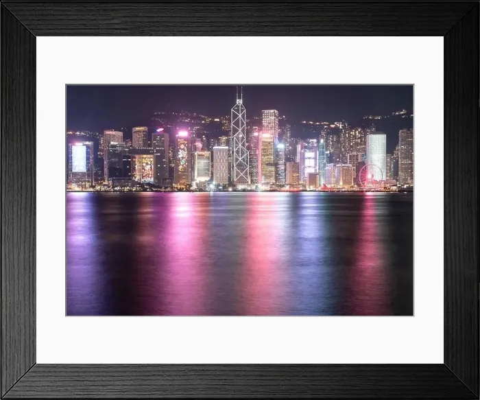 Framed Print : The incredible night cityscape view of lights on the water on Victoria Harbour in Hong Kong Framed Print : The incredible night cityscape view of lights on the water on Victoria Harbour in Hong Kong