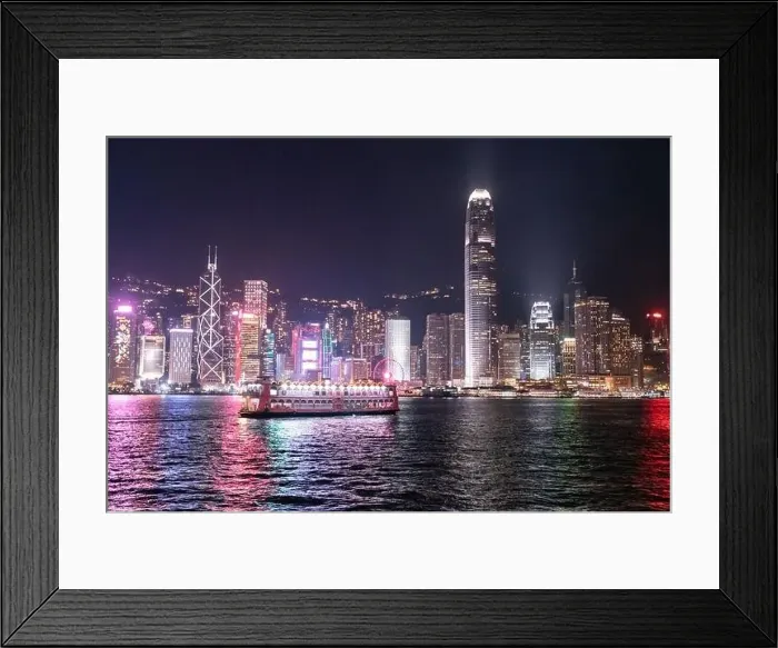 Framed Print : The incredible night cityscape view of lights on the water on Victoria Harbour in Hong Kong Framed Print : The incredible night cityscape view of lights on the water on Victoria Harbour in Hong Kong