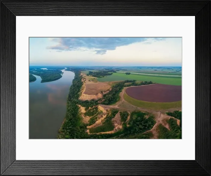 Framed Print : Aerial drone view of river landscape in sunny summer evening Framed Print : Aerial drone view of river landscape in sunny summer evening