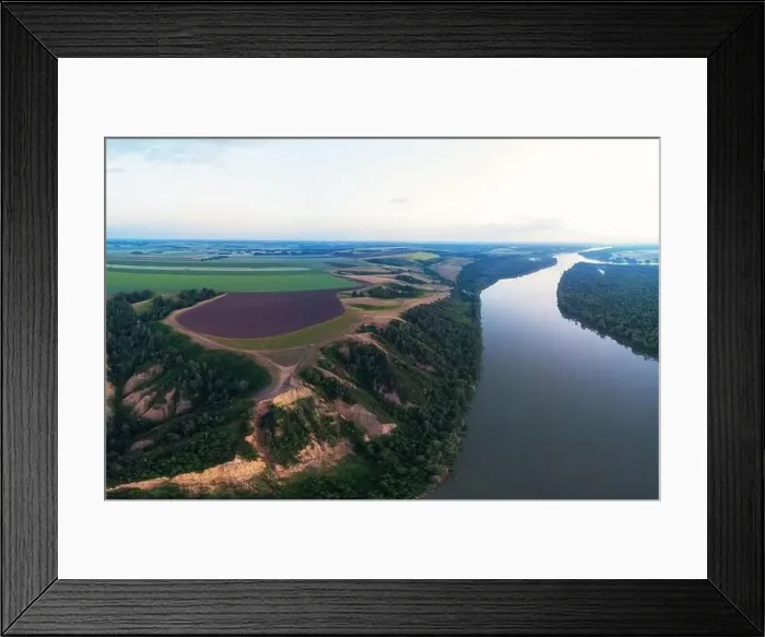 Framed Print : Aerial drone view of river landscape in sunny summer evening Framed Print : Aerial drone view of river landscape in sunny summer evening