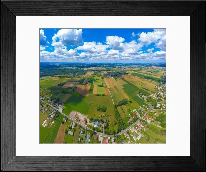 Framed Print : Stunning aerial panorama from a drone of countryside, village, green fields and trees, agriculture concept Framed Print : Stunning aerial panorama from a drone of countryside, village, green fields and trees, agriculture concept