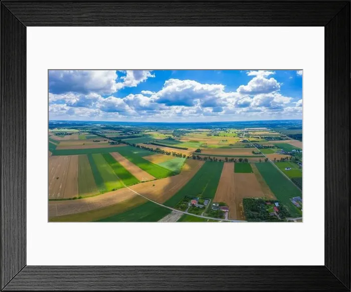 Framed Print : Stunning aerial panorama from a drone of countryside, village, green fields and trees, agriculture concept Framed Print : Stunning aerial panorama from a drone of countryside, village, green fields and trees, agriculture concept