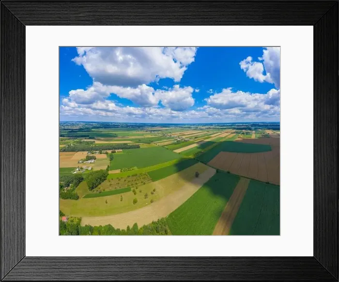 Framed Print : Stunning aerial panorama from a drone of countryside, village, green fields and trees, agriculture concept Framed Print : Stunning aerial panorama from a drone of countryside, village, green fields and trees, agriculture concept
