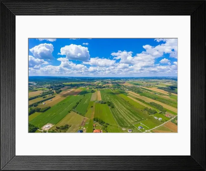Framed Print : Stunning aerial panorama from a drone of countryside, village, green fields and trees, agriculture concept Framed Print : Stunning aerial panorama from a drone of countryside, village, green fields and trees, agriculture concept