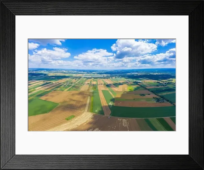 Framed Print : Stunning aerial panorama from a drone of countryside, village, green fields and trees, agriculture concept Framed Print : Stunning aerial panorama from a drone of countryside, village, green fields and trees, agriculture concept