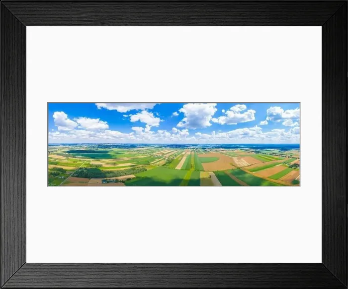 Framed Print : Beautiful panoramic aerial view photo from flying drone to Meadow with dandelions on a sunny day Framed Print : Beautiful panoramic aerial view photo from flying drone to Meadow with dandelions on a sunny day