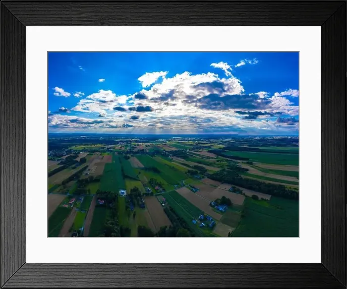 Framed Print : Stunning aerial panorama from a drone of countryside, village, green fields and trees, agriculture concept Framed Print : Stunning aerial panorama from a drone of countryside, village, green fields and trees, agriculture concept