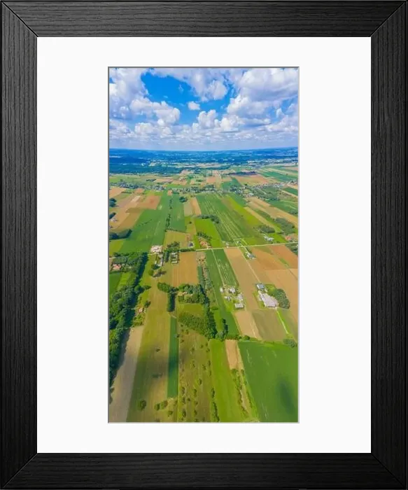 Framed Print : Stunning aerial panorama from a drone of countryside, village, green fields and trees, agriculture concept Framed Print : Stunning aerial panorama from a drone of countryside, village, green fields and trees, agriculture concept