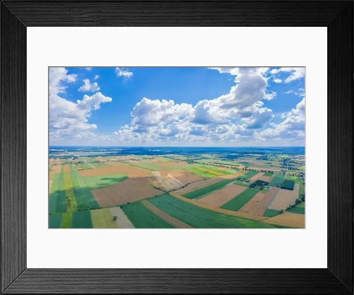 Framed Print : Stunning aerial panorama from a drone of countryside, village, green fields and trees, agriculture concept Framed Print : Stunning aerial panorama from a drone of countryside, village, green fields and trees, agriculture concept