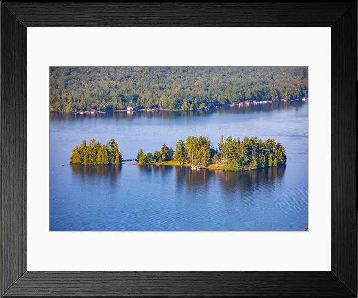 Framed Print : Aerial view of houses on an island of a summer lake above Framed Print : Aerial view of houses on an island of a summer lake above