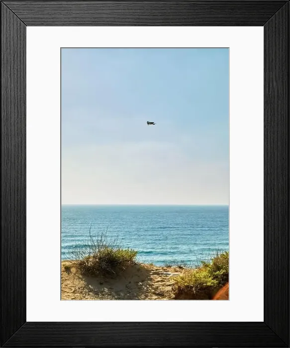 Framed Print : View of the Mediterranean Sea from the hills at sunset and a flying drone Framed Print : View of the Mediterranean Sea from the hills at sunset and a flying drone
