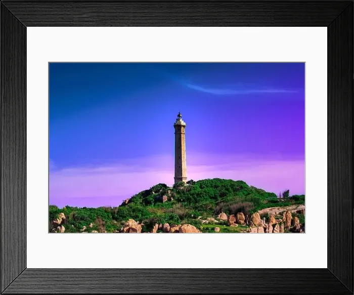 Framed Print : Ke Ga lighthouse at sunset in Vietnam. Purple blue sky background Framed Print : Ke Ga lighthouse at sunset in Vietnam. Purple blue sky background